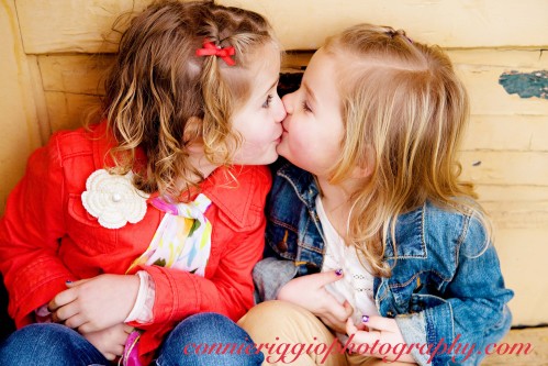 Sisters Kissing
